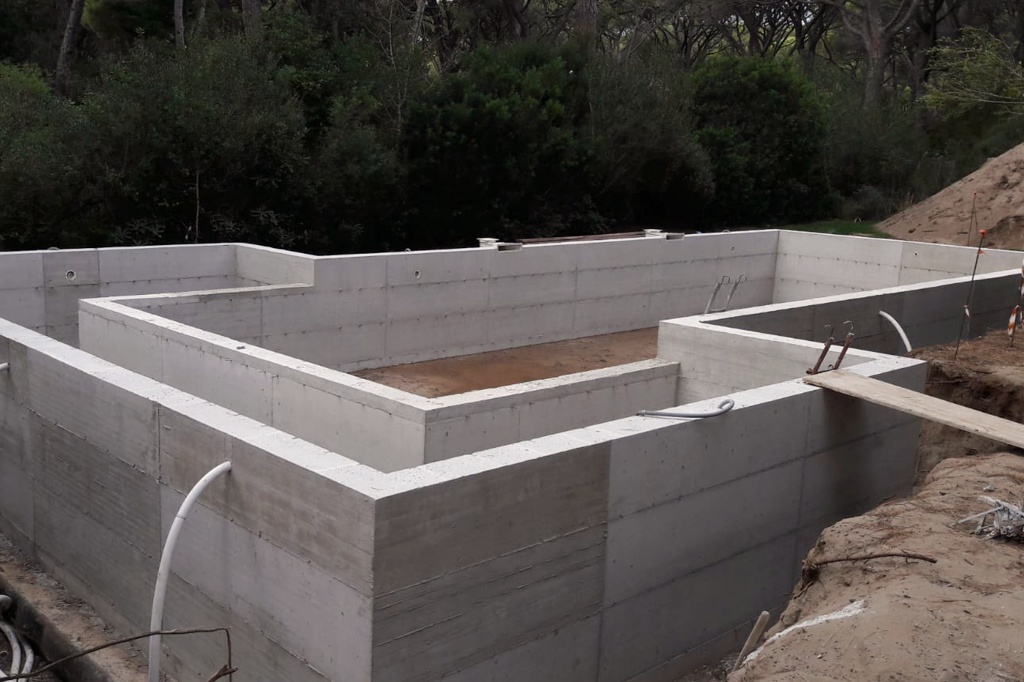 Natural pool construction with concrete